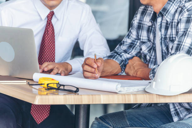 contractor-construction-engineer-meeting-together-on-architect-table-picture-id1272345131